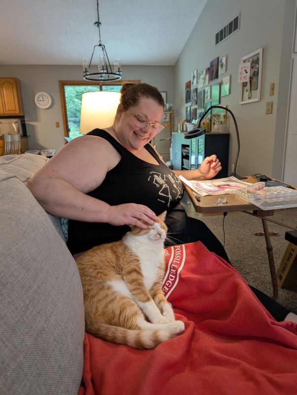 Kate Doing Art and Petting Our Cat